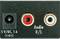 'Audio L/R' sockets with red and white connectors next to a 5V/DC, 1A power socket on a black surface.