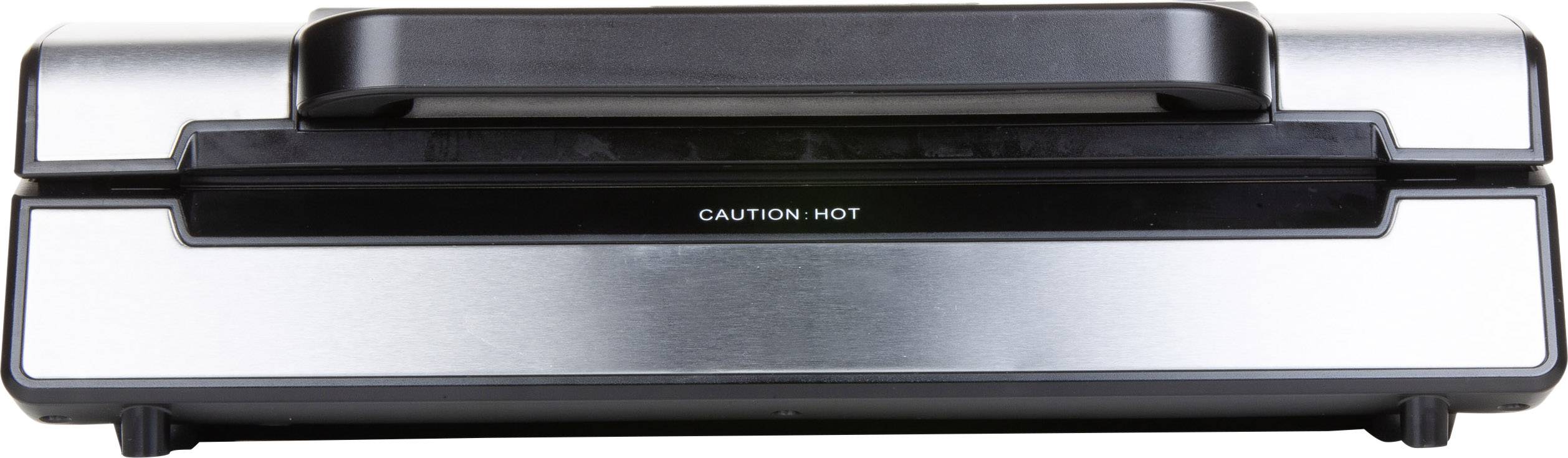 A silver electric grill with a black handle. Text on the front: 'Caution Hot'.