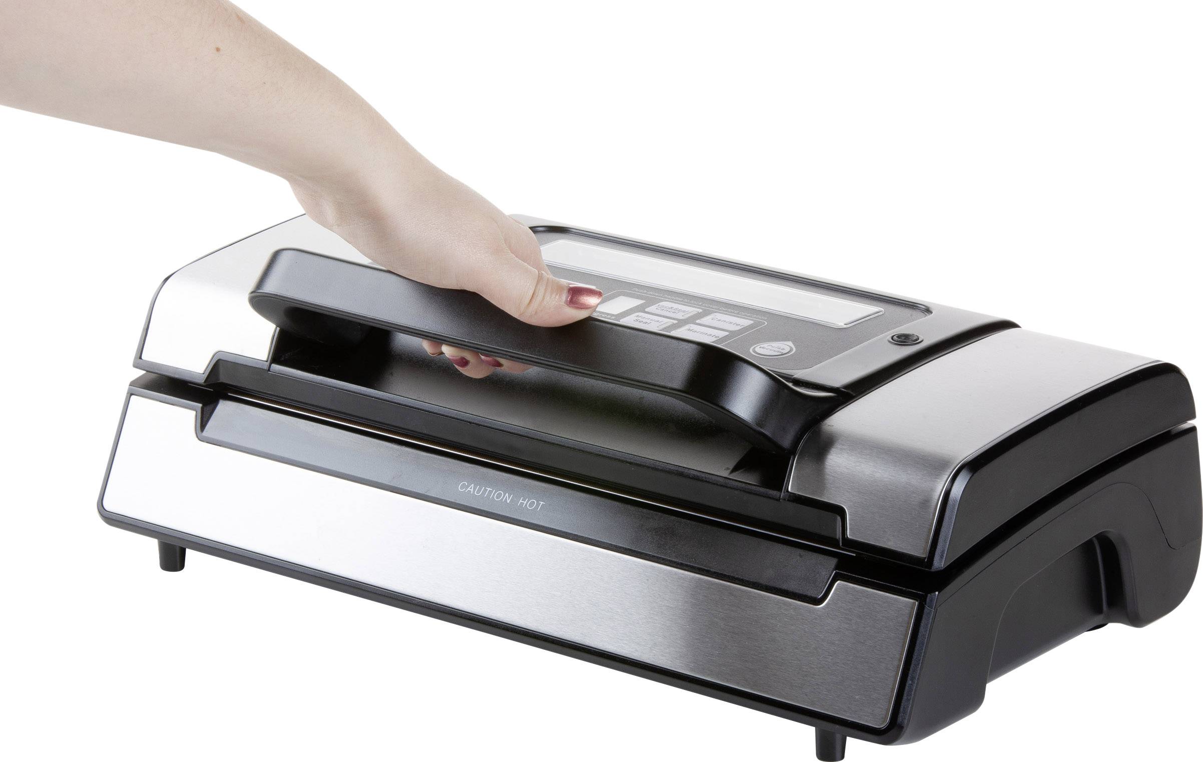 A hand holds the handle of a silver hot sealing device. The device is used for sealing documents.