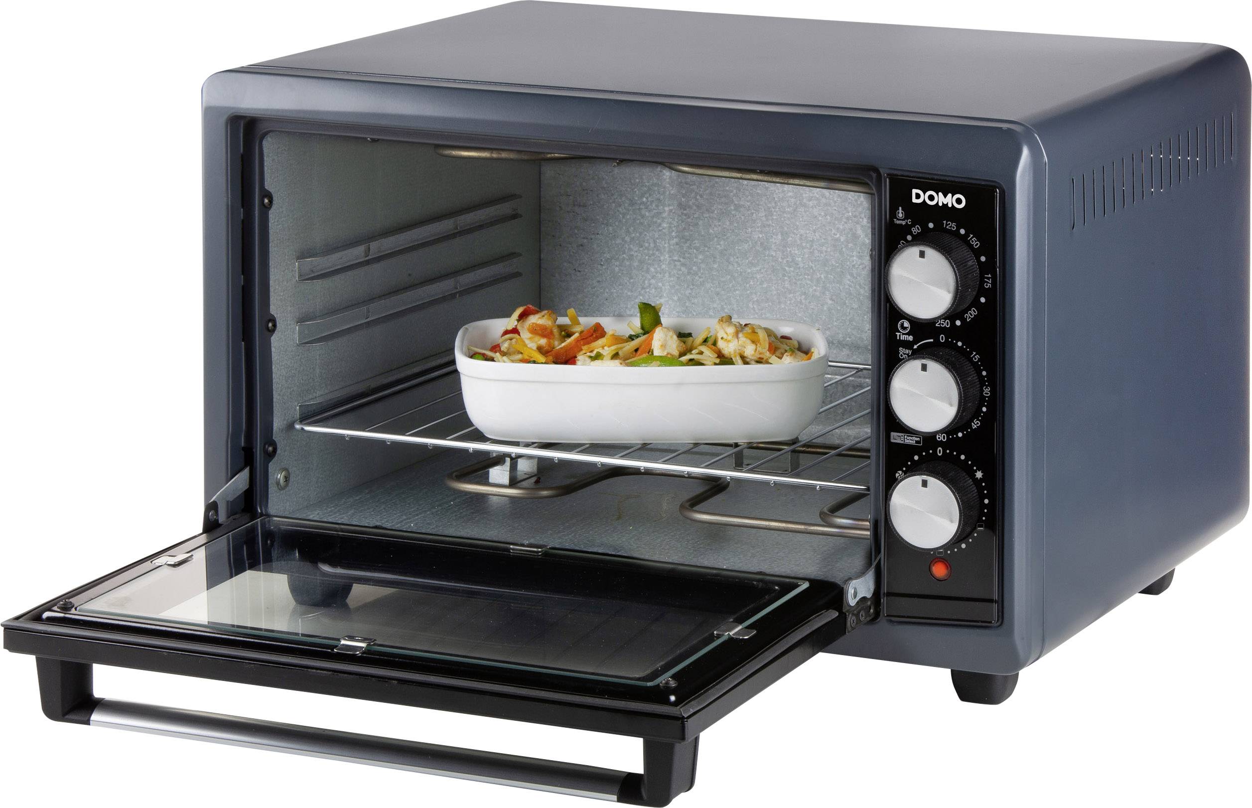 A small, grey table oven with an open door; inside is a casserole dish with a gratinated dish on a rack.