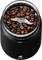 Coffee grinder with lid open, filled with freshly roasted coffee beans. Cutting blade is visible.