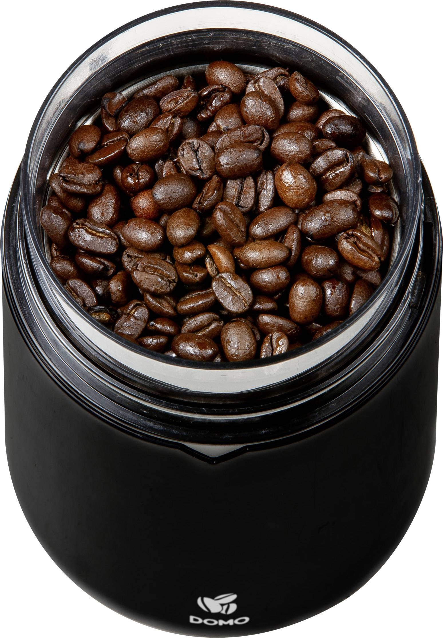 A black container filled with roasted coffee beans, photographed from above. A logo and the text 'DOMO' are displayed on the container.