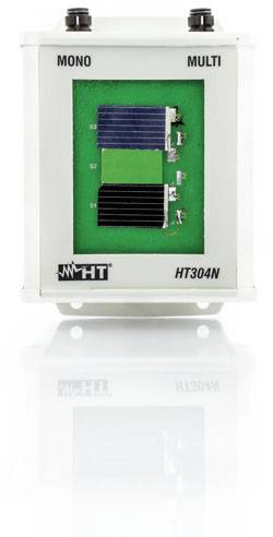 A white device with 'MONO' and 'MULTI' written on top, displays two black solar modules positioned one above the other against a green background.