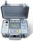 Digital measuring device in a grey plastic housing with an open lid. Displays various electrical measurement values on a screen.