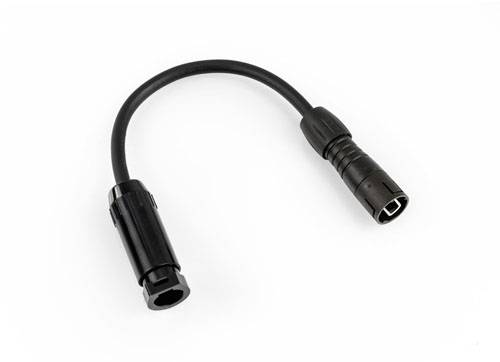 A black adapter cable with a round plug on one side and a rectangular plug on the other side.