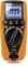 A digital multimeter with an orange-coloured casing. The display shows '1999 MΩ'. The device has various buttons and rotary switches for measuring electrical values.