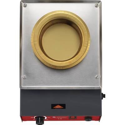 Hot air oven with gold-coloured opening, metal casing and red control element. 'HOT' note on front panel.