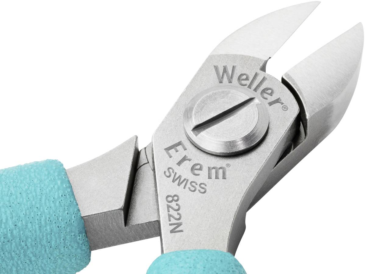 Side cutters with turquoise handles, stainless steel blades, engraved with 'Weller Erem Swiss 822N', close-up of the cutting surface.