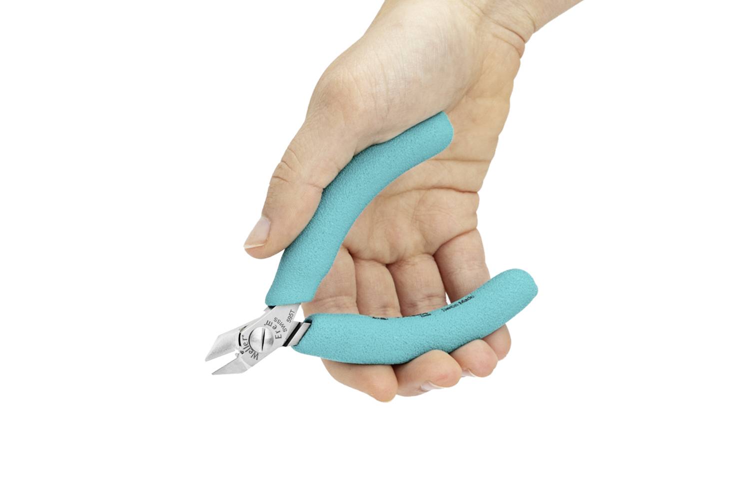 A hand is holding a small pair of pliers with blue handles, suitable for precision cutting of wire or fine materials.