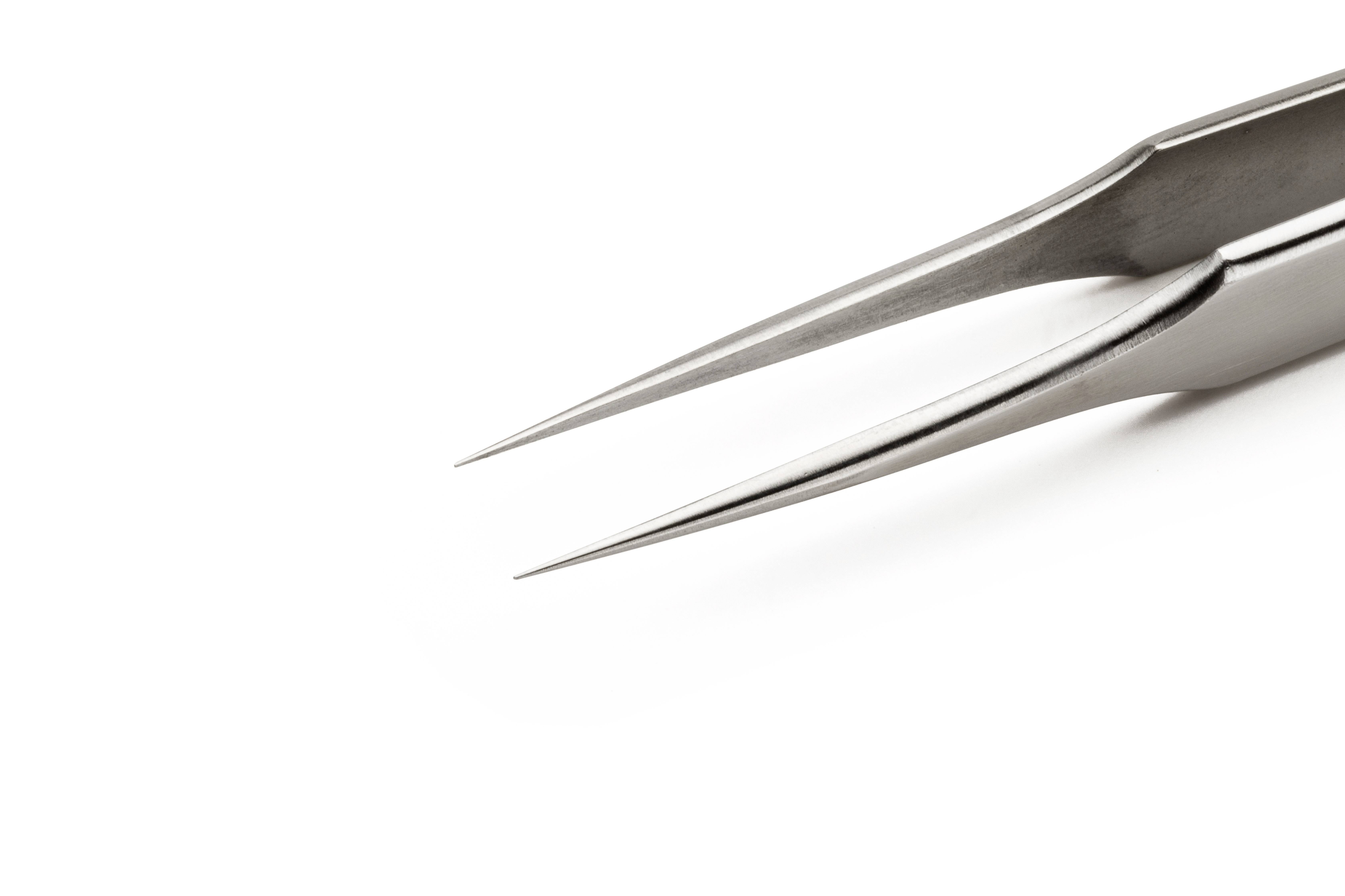 A close-up of a precise stainless steel tweezers with fine tips on a white background. Suitable for intricate work in medicine or engineering.