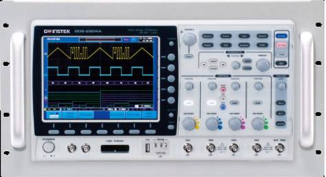 The image depicts an oscilloscope with a digital display. It shows multiple waveforms and various controls and buttons for operating the device.