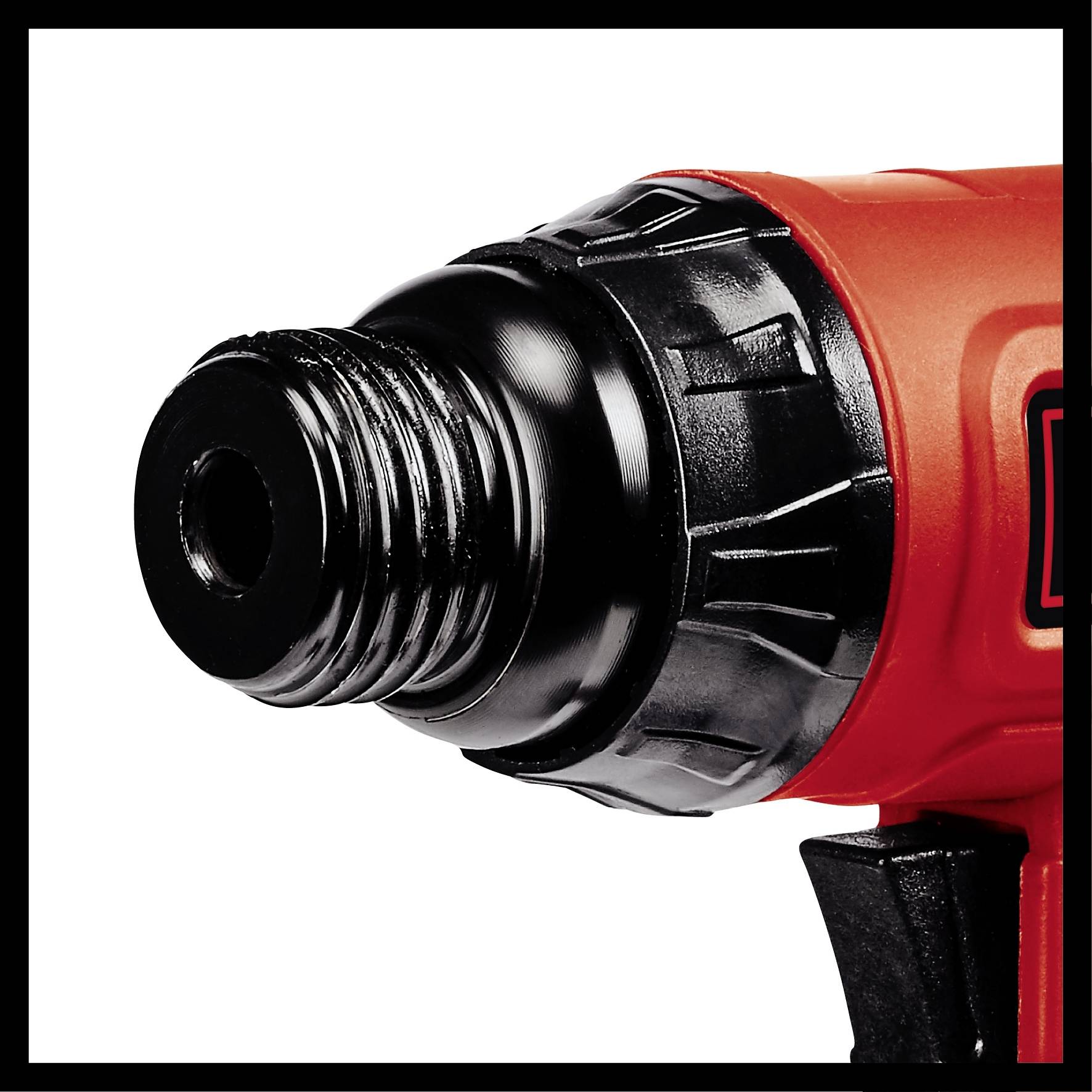 Close-up of an orange electric screwdriver with a black drill chuck, suitable for DIY and construction projects.