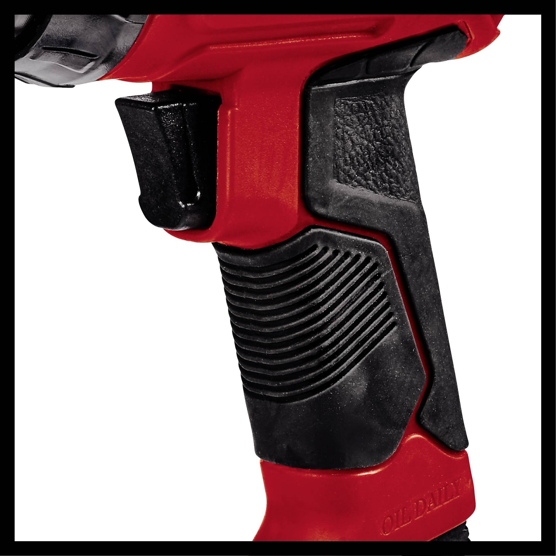 Cordless drill, close-up of the handle in black and red. Shows the textured grip and black trigger button.