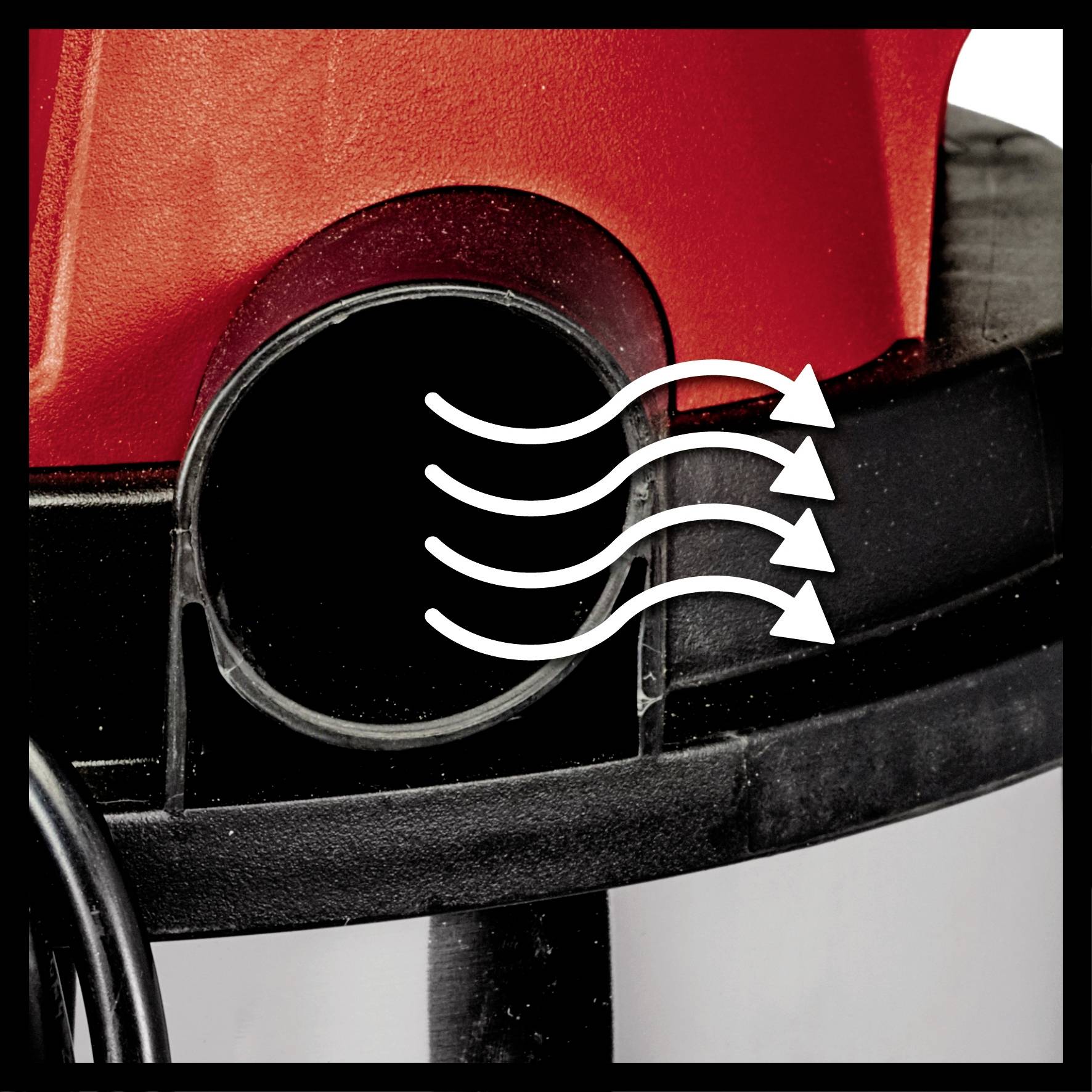 Red machine with a black base. Outlet opening with white arrows indicating air flow. Function of extraction or ventilation.