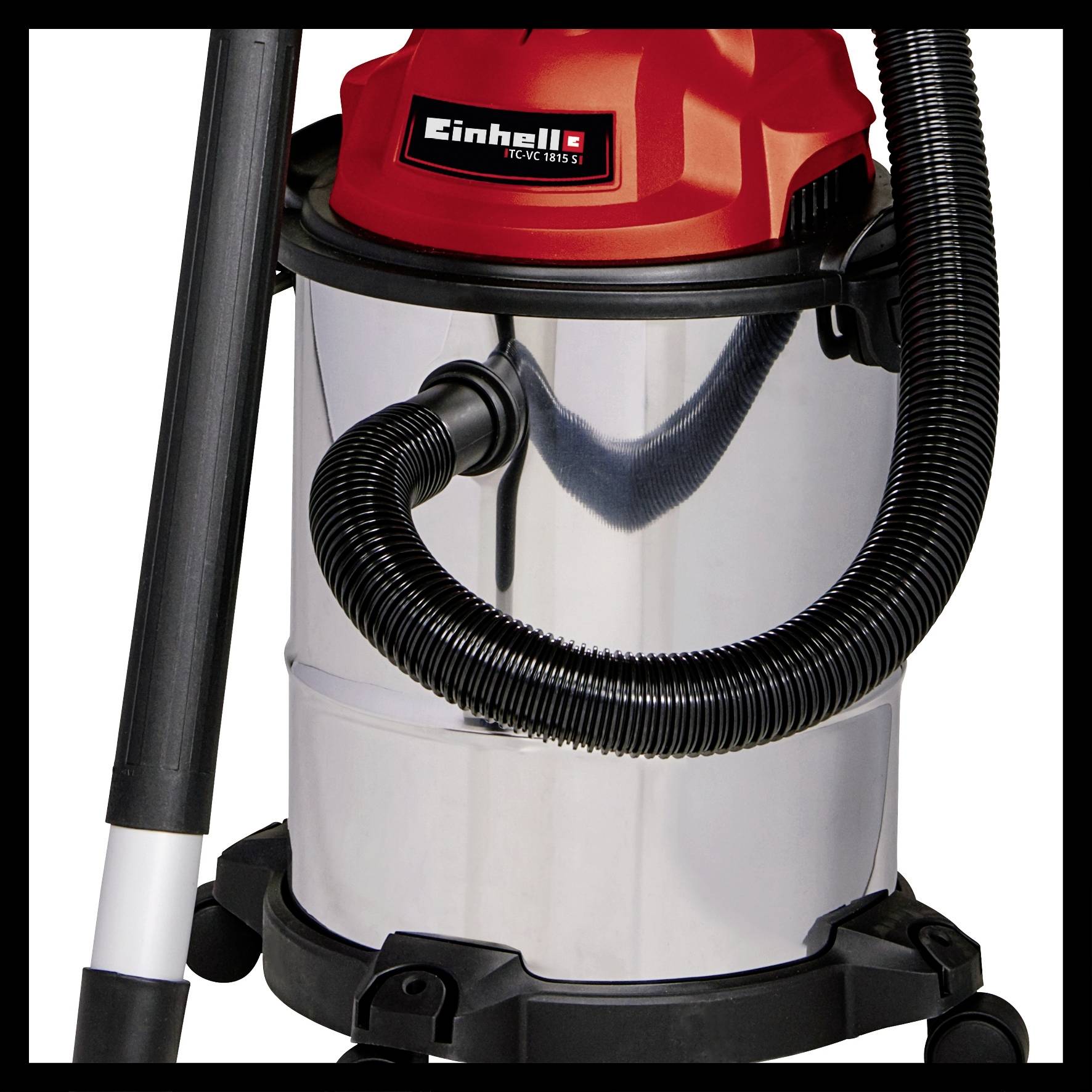 A vacuum cleaner with a red and silver casing, flexible suction hose, and wheels underneath.