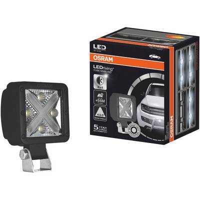 A square LED driving light from OSRAM in the foreground next to a package with a car illustration, the product is designed for enhanced visibility.