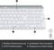 Keyboard with Windows key layout, 12 function keys, additional numeric keypad and quiet, low-profile keys.