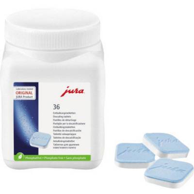 A white container with the label 'jura' contains 36 blue descaling tablets. Three tablets are visible next to the container.