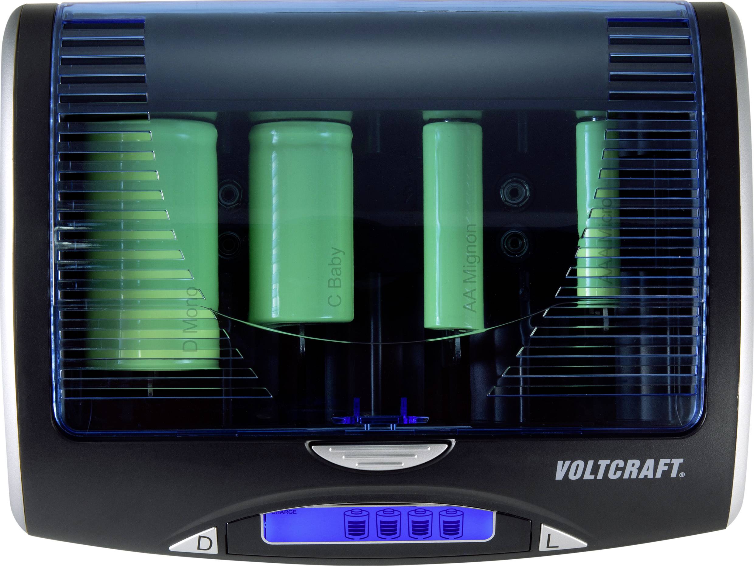 Battery charger with three green batteries in the charging compartment, enclosed by a blue, transparent cover.
