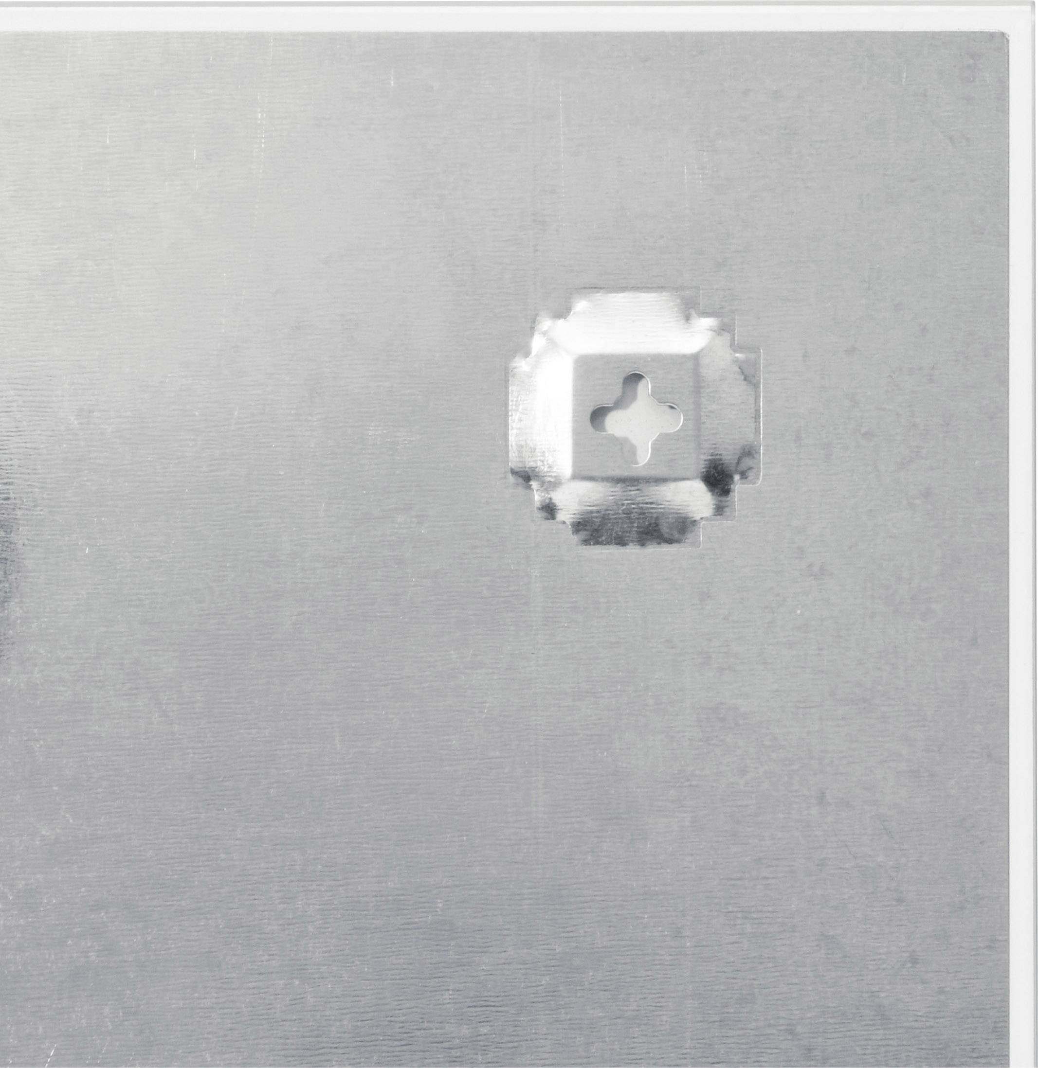 A square metal sheet with a central, screw-shaped opening in the top right corner.