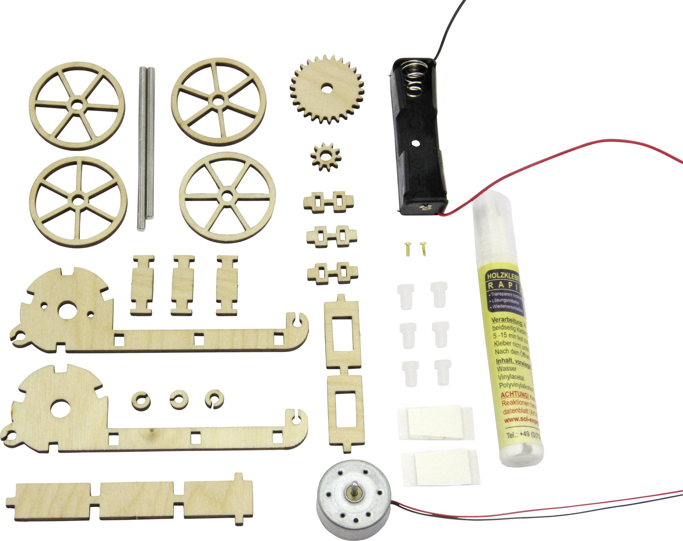 Parts kit for a vehicle model: Wooden wheels, gears, axles, motor, plastic mountings, cables and glue tube.