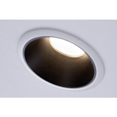 Ceiling spotlight with a round, white frame, emitting warm light.
