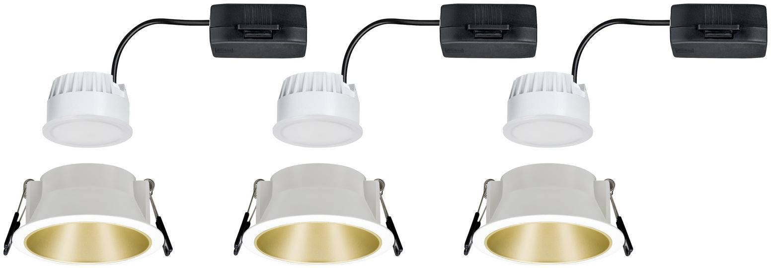 Three round ceiling spotlights with gold-coloured inner surfaces and white casings, each connected to a black connection module.