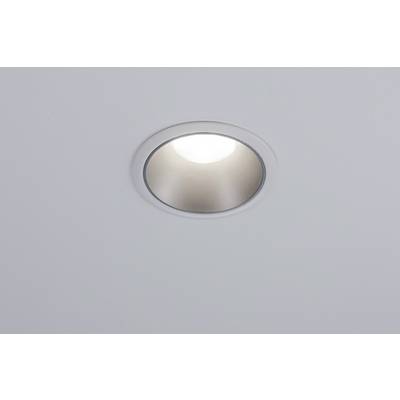 A round ceiling light emits a warm, white light. The light is recessed into a smooth, white ceiling.