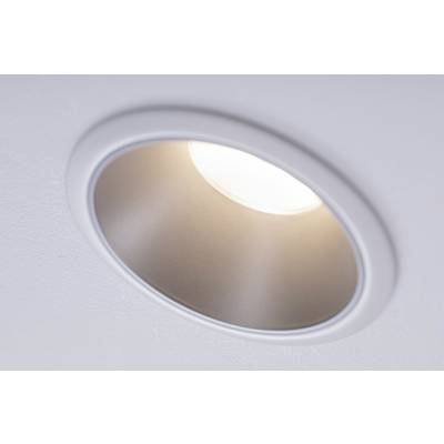 A round, recessed ceiling light shines brightly.
