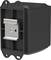 A black plastic block with metallic details, possibly an electrical component or a module, in a mounting bracket.