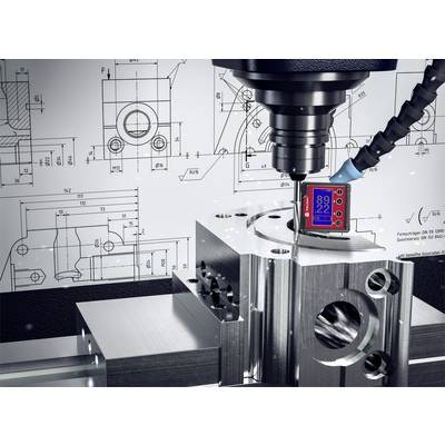 A CNC machine is machining a metal part, surrounded by technical drawings. A red display is showing measurement values.