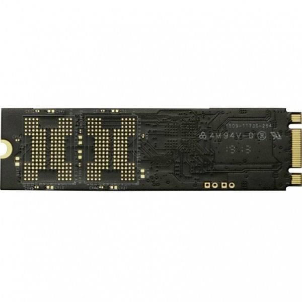 'Dark NVMe SSD circuit board, close-up, with golden contact points on the right. Compact design for rapid data storage access.'