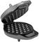 Opened waffle iron with multiple spherical indentations, suitable for preparing bubble waffles.
