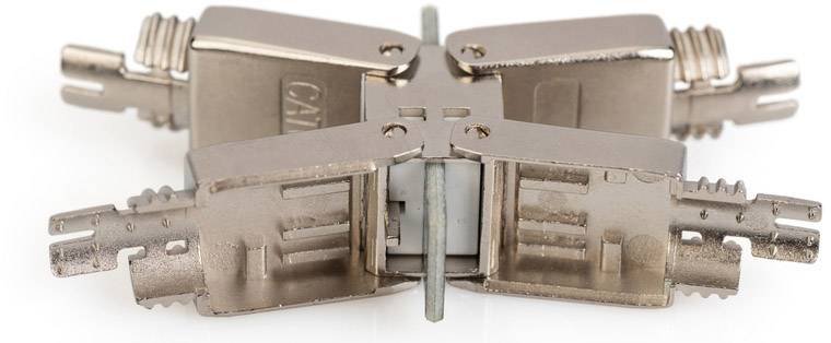 Four open electrical metal connectors, symmetrically arranged, show the internal contacts.