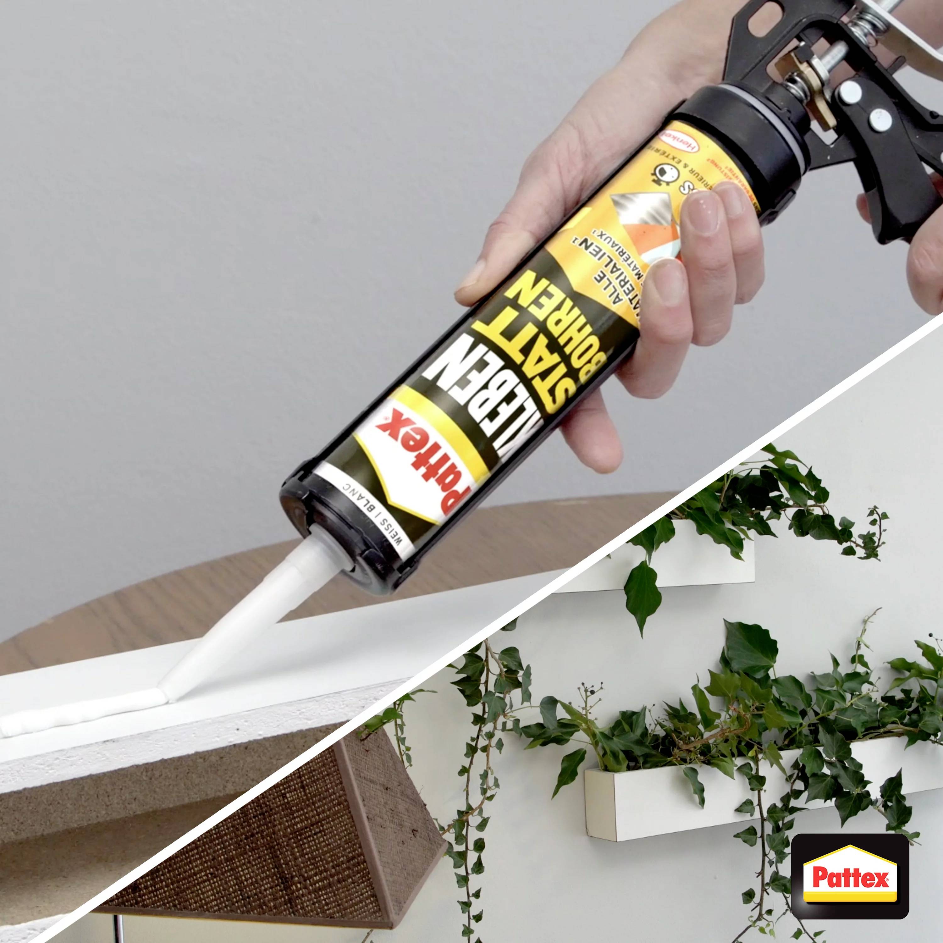 A hand applies white adhesive from a cartridge onto a wooden batten. In the background, a wall with plant shelves is visible.