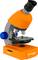Oranges and grey student microscope with eyepiece, objective turret head and objective carrier on a rotatable base. Suitable for educational use.