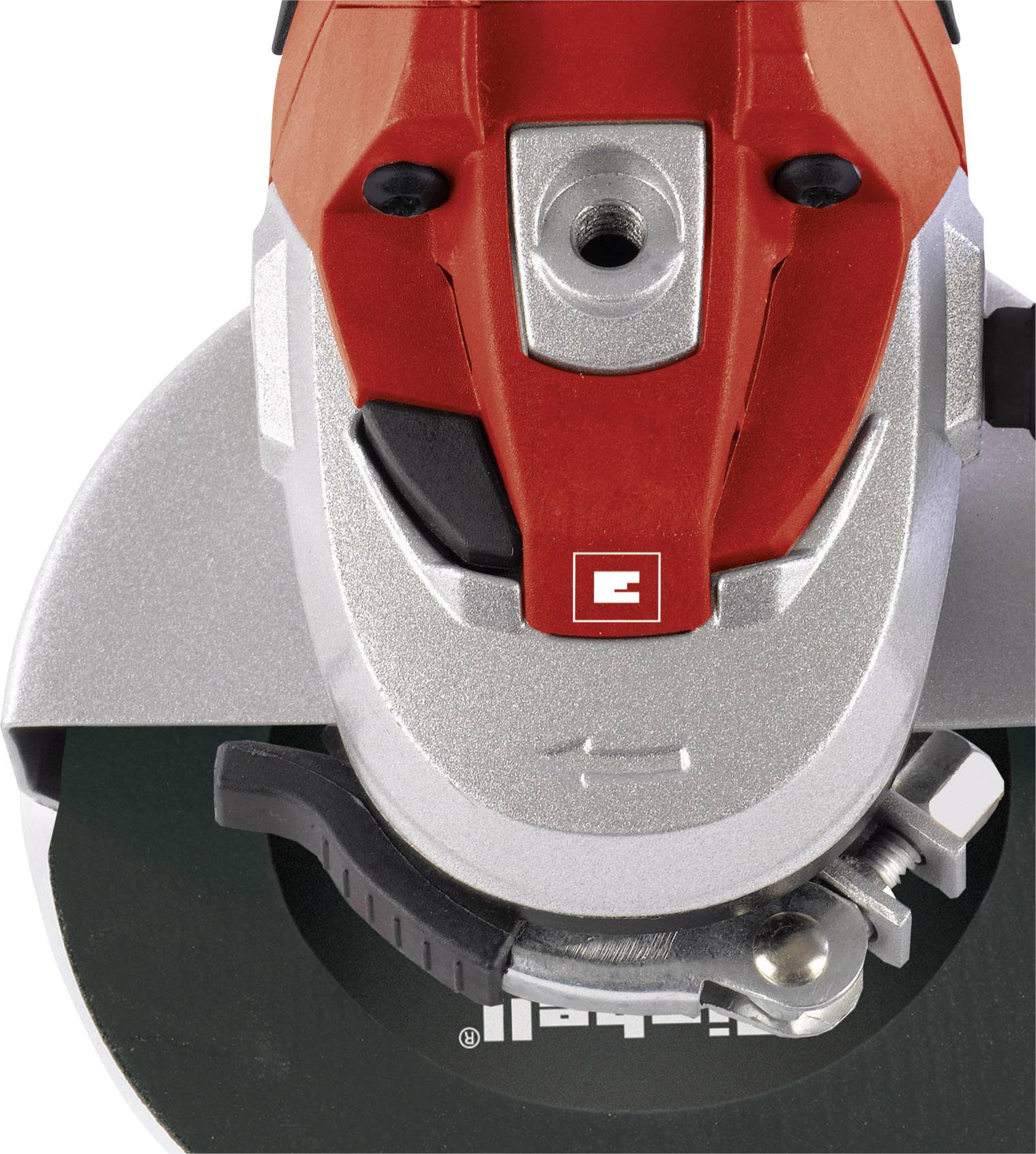 Close-up of an angle grinder with a red casing and black cutting disc. Brand logo visible on the device.