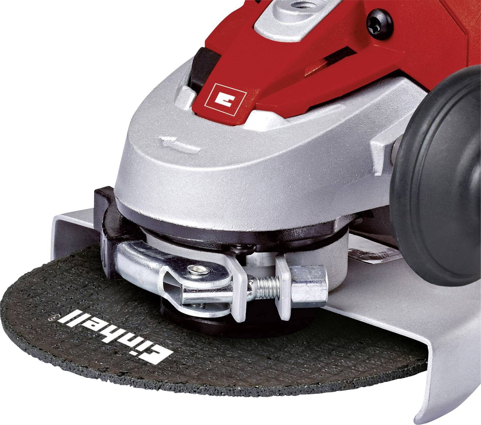 Close-up of an electric angle grinder, with a red casing and grinding disc.