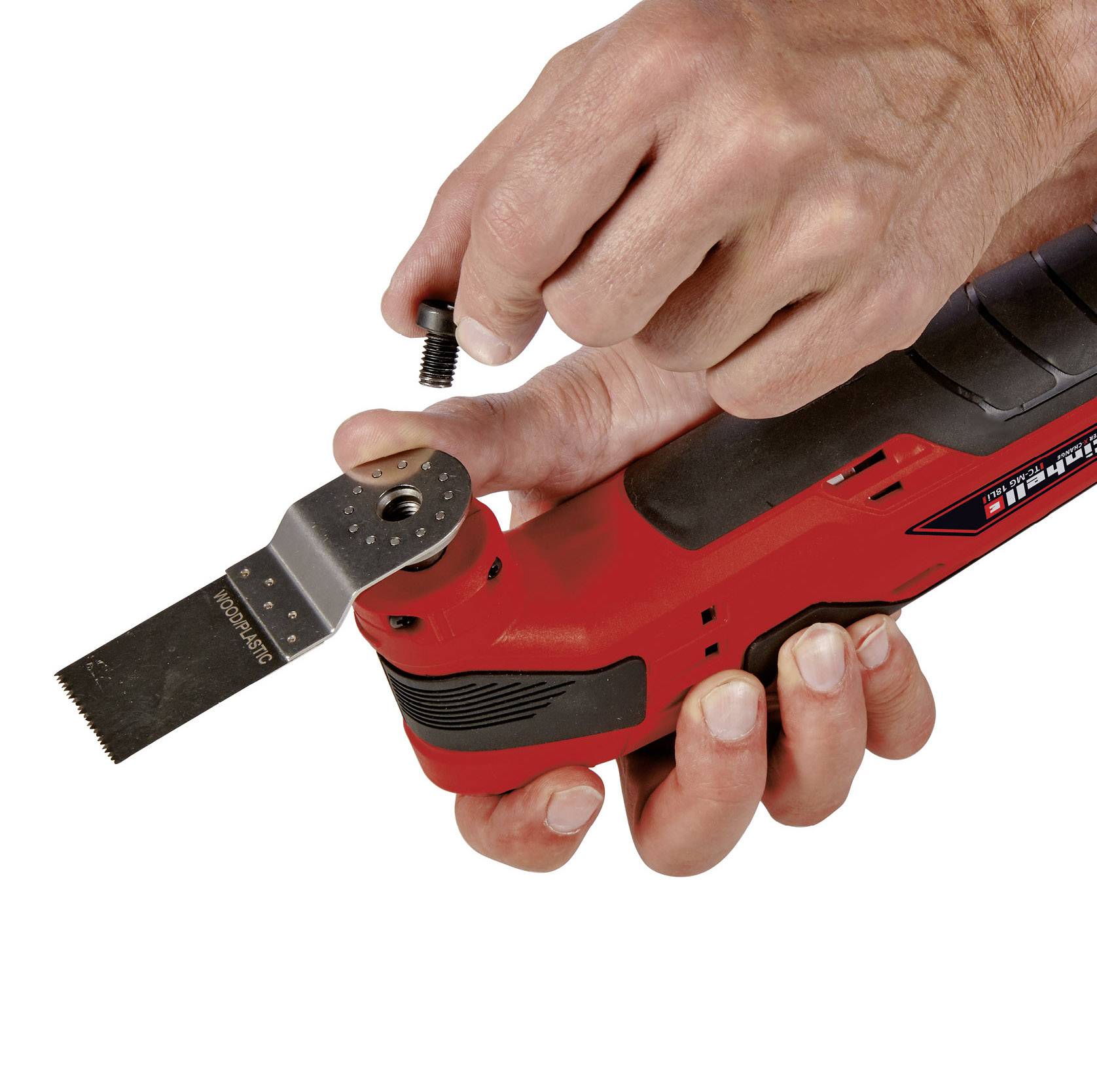 A hand is holding an electric multi-tool with a saw blade, ready for assembly.