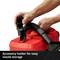 Hands are attaching a nozzle to a red vacuum cleaner with the label 'Accessory holder for easy storage of nozzles'.
