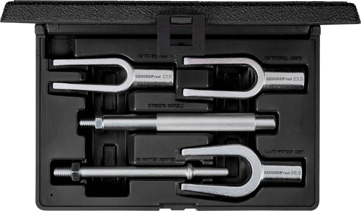 Black toolbox with three puller spanners and a pulling hammer, which are nestled in shaped recesses.