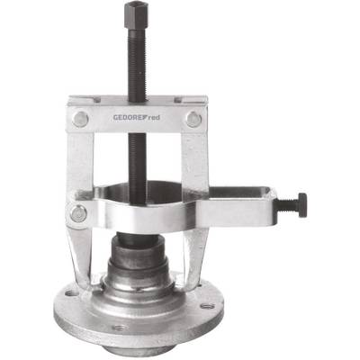 A silver puller with a central screw mechanism used for removing tightly fitted parts such as ball bearings.