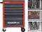 Red tool trolley with six drawers, filled with various hand tools such as spanners, screwdrivers, and pliers.