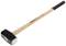 A sledgehammer with a wooden handle and black head lies at an angle, with the brand name 'GEDORE' clearly visible.