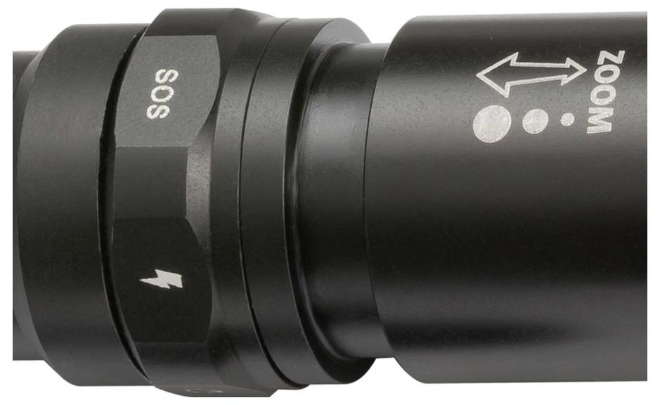 Close-up of a black flashlight head with rotating control ring labeled 'SOS', lightning symbol, and 'ZOOM' with arrow indicator.