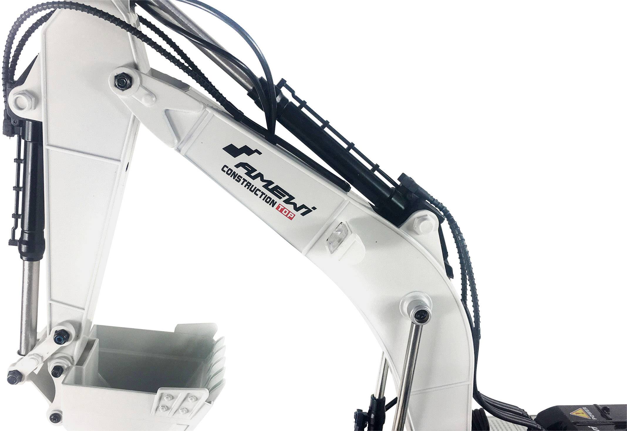 A white excavator arm with the inscription 'Construction 1:01' lifts a small bucket.