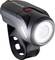 A black LED bicycle light with mount, gleaming brightly. Brand logo 'SIGMA' visible on the top surface.