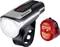 Bicycle light set comprising a silver, rechargeable front light with battery level indicator and a red rear light.