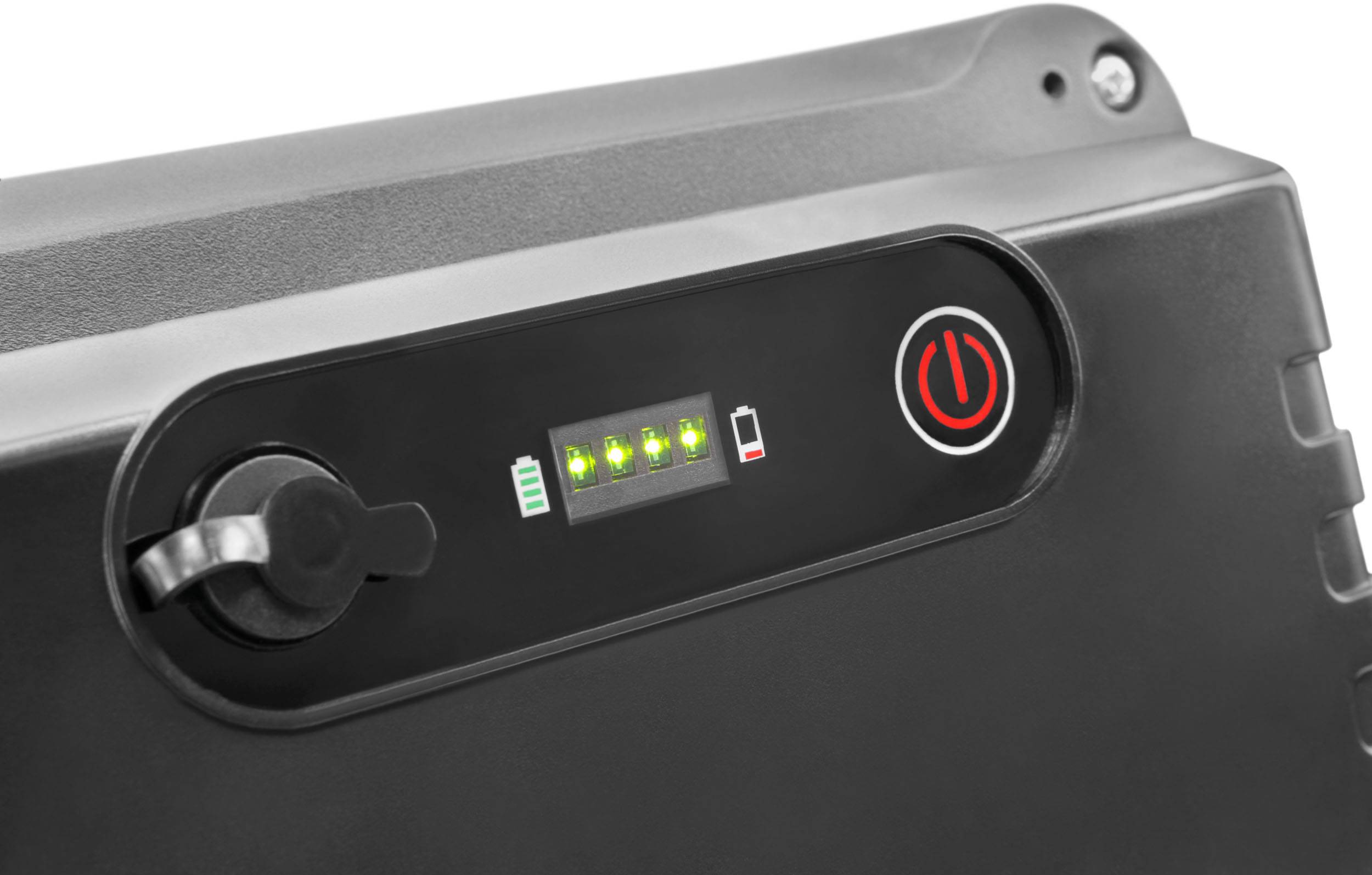 A black battery with a charge status indicator: four green LEDs and a red power button. Battery is almost fully charged.