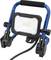 A portable LED floodlight with a blue carry handle and black casing, ideal for construction site or workshop. Cable is visible.